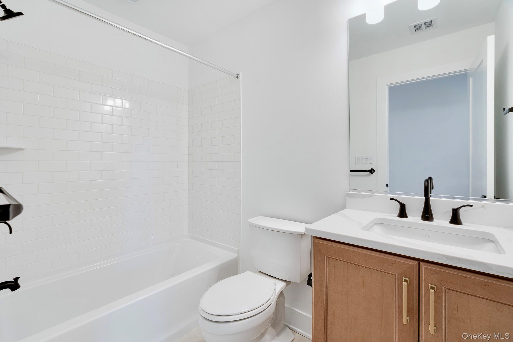 4044 Chestnut Rdg Road Fishkill, NY 12524 - Photo 15 of 26 a bathroom with a sink a toilet and shower