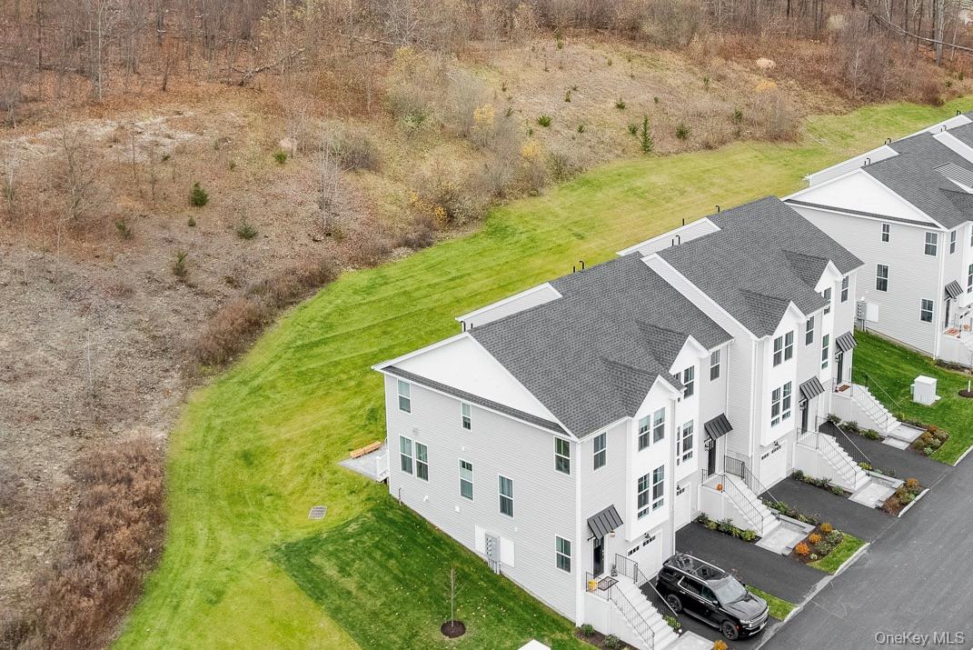 4044 Chestnut Rdg Road Fishkill, NY 12524 - Photo 23 of 26 a aerial view of a house with a yard