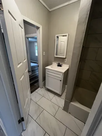 a bathroom with a bathtub and toilet