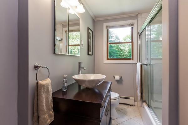 47 Ansie Road Chelmsford, MA 01824 - Photo 15 of 26 a bathroom with a toilet sink and mirror