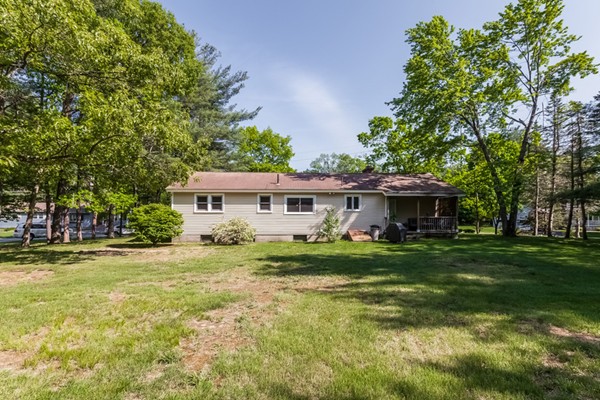 47 Ansie Road Chelmsford, MA 01824 - Photo 24 of 26 a front view of a house with a garden