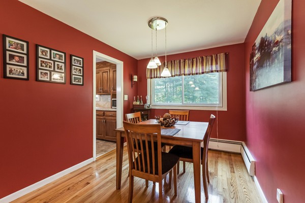 47 Ansie Road Chelmsford, MA 01824 - Photo 7 of 26 a view of a dining room with furniture window and wooden floor