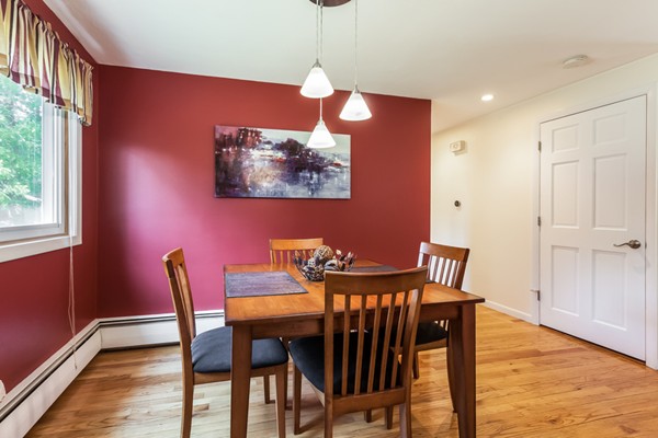 47 Ansie Road Chelmsford, MA 01824 - Photo 8 of 26 a view of a dining room with furniture and wooden floor
