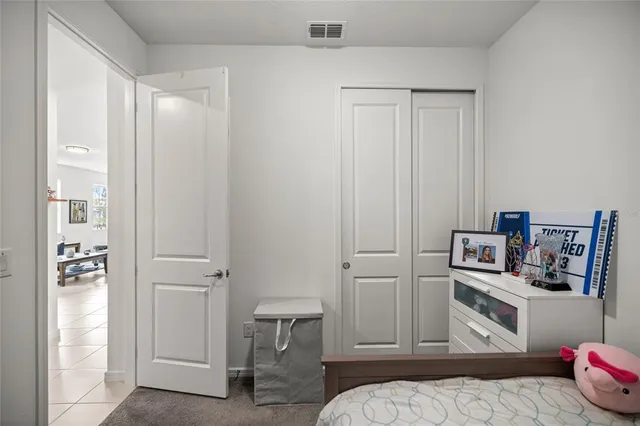 a kitchen with stainless steel appliances a refrigerator and cabinets