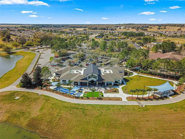 an aerial view of a house with a ocean view