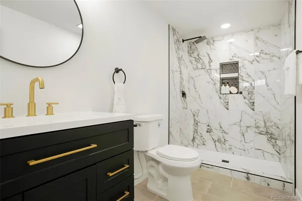 a view of an empty room with a windows