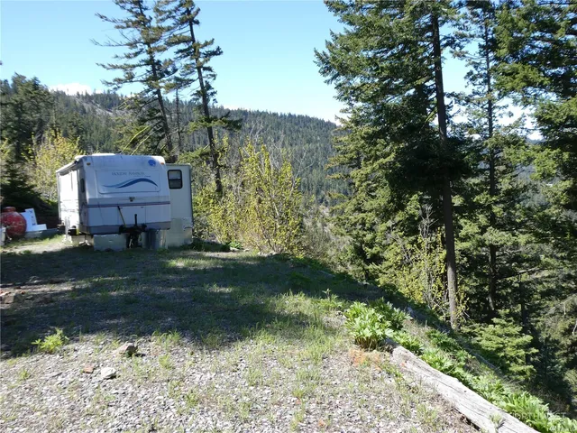 a view of a back yard of the house