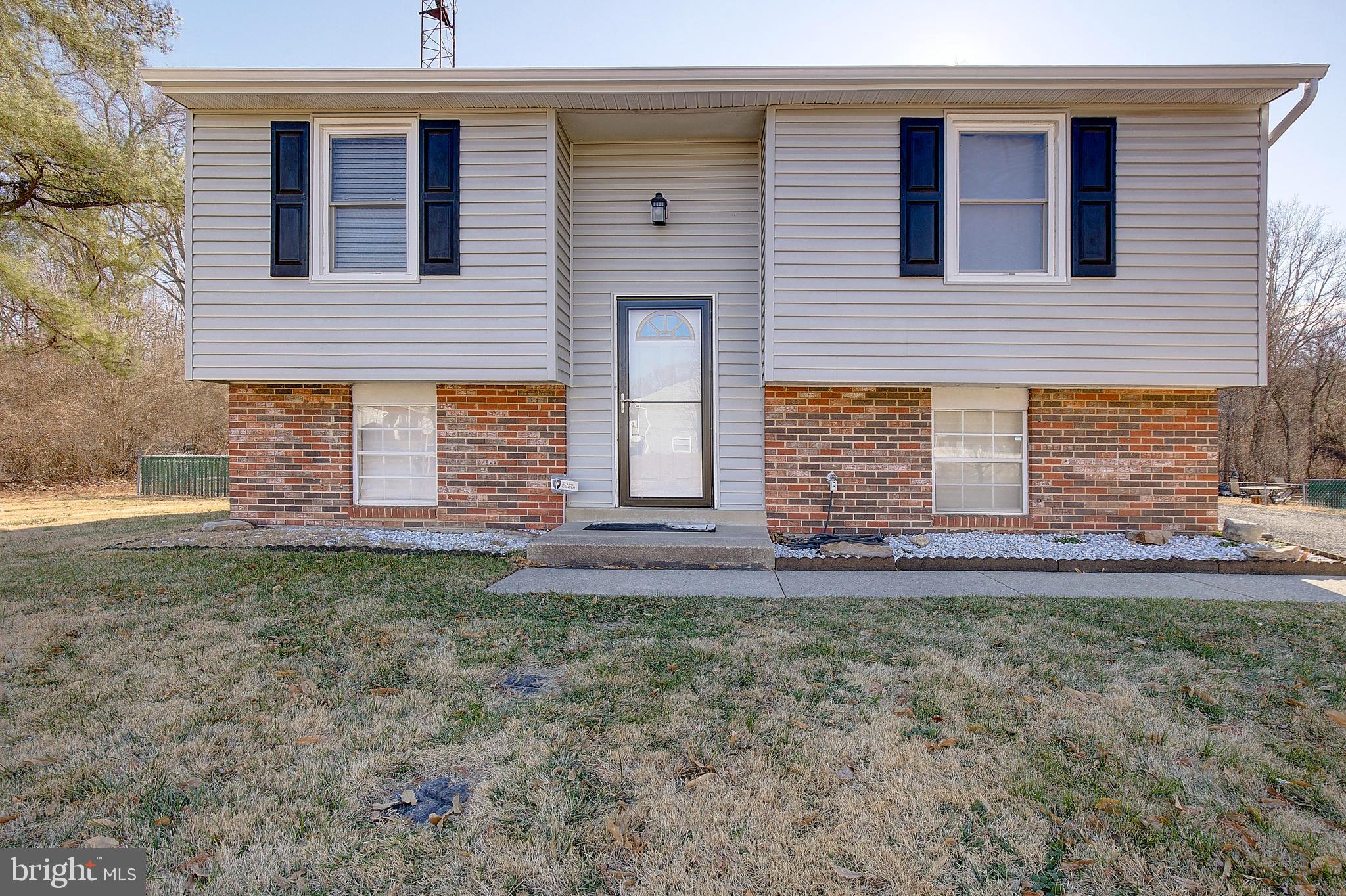3611 Blackwater Road Clinton, MD 20735 - Photo 26 of 31 a front view of a house with garden