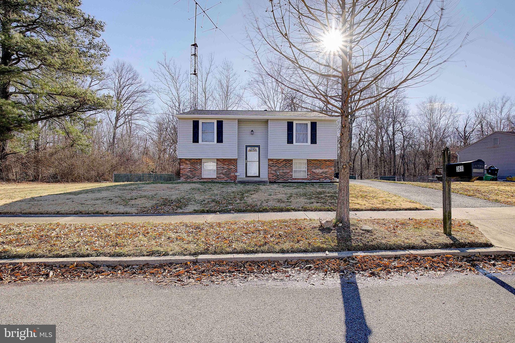3611 Blackwater Road Clinton, MD 20735 - Photo 27 of 31 a front view of a house with trees