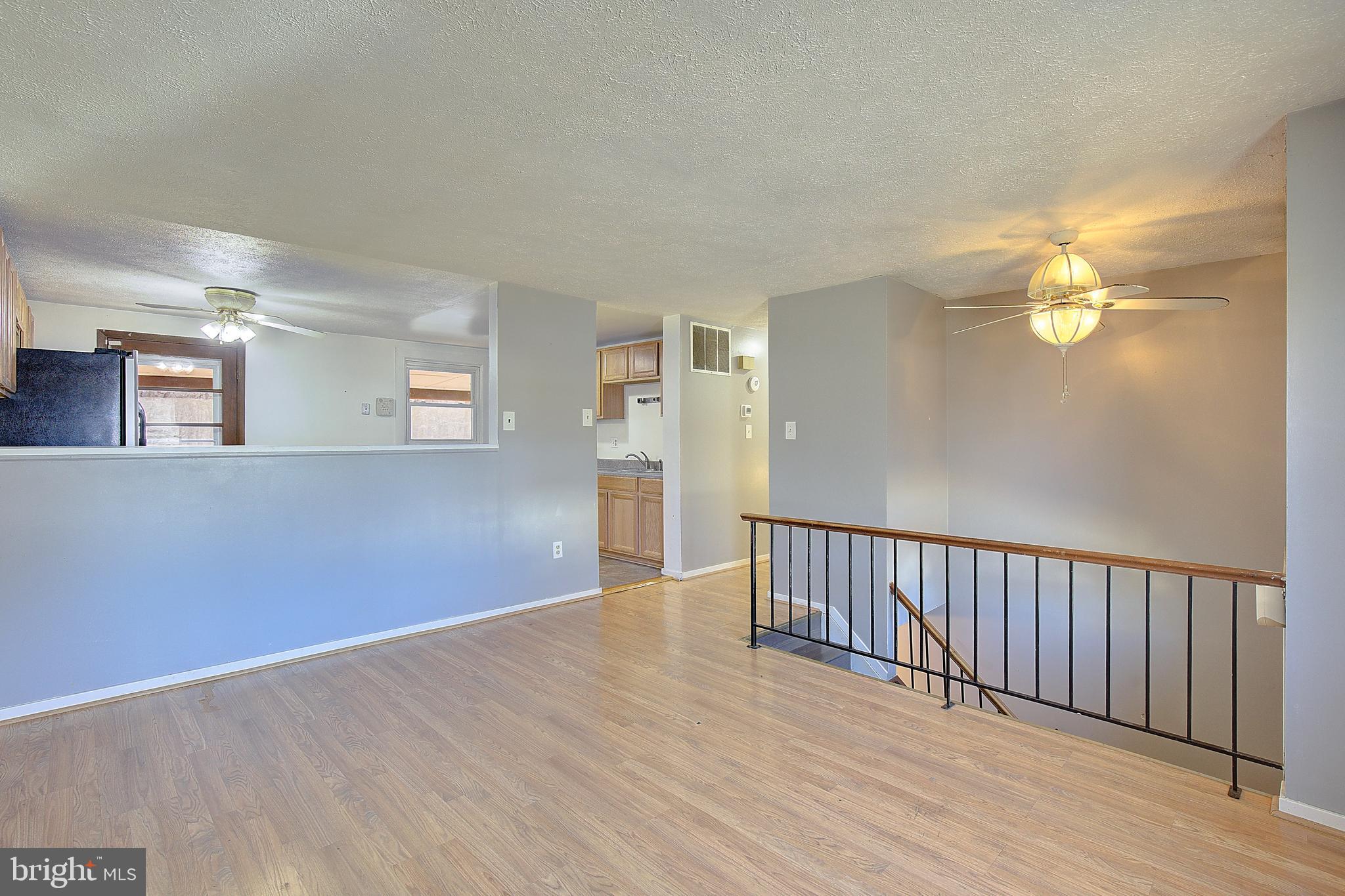 3611 Blackwater Road Clinton, MD 20735 - Photo 4 of 31 a view of a livingroom with wooden floor