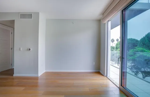 a view of an empty room and window