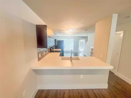 a bathroom with a sink and mirror