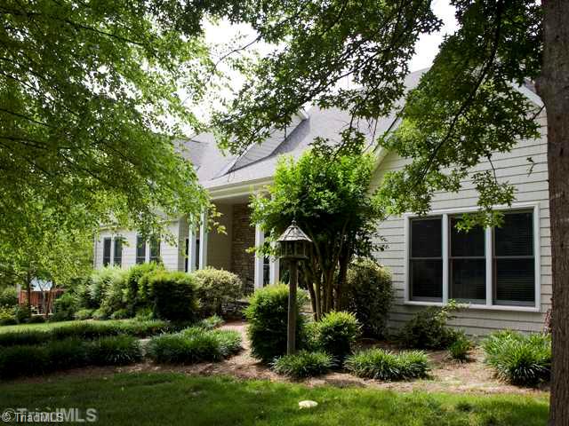 5811 Billet Road Oak Ridge, NC 27310 - Photo 1 of 16 Exterior Front. Shaded by numerous mature trees, custom built home features casual elegance for many lifestyles.