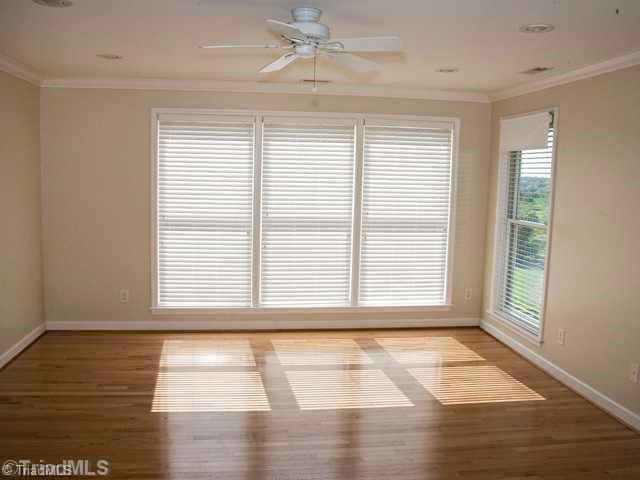 5811 Billet Road Oak Ridge, NC 27310 - Photo 11 of 16 Master Bedroom. Large master suite is strategically situated to take in the most spectacular views, especially the sunsets!