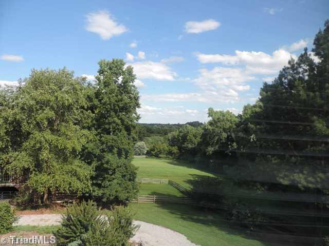 5811 Billet Road Oak Ridge, NC 27310 - Photo 5 of 16 View. A grazing paradise for your equine friends! This is the view from the second story master bedroom window! Where Peace Awaits!