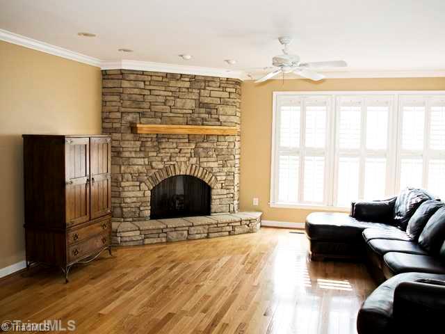 5811 Billet Road Oak Ridge, NC 27310 - Photo 8 of 16 Den/Family/Great Room. Gather round the floor-to-ceiling stone fireplace on a cold winter night. This newer addition overlooks the gently rolling pastures.