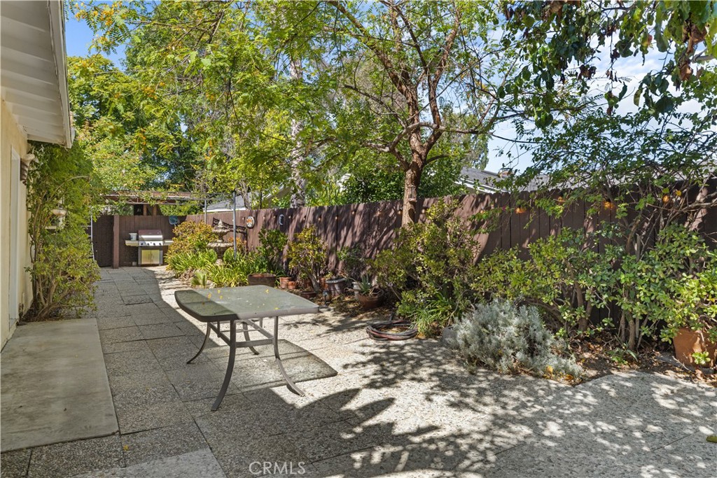 26096 Adamor Road Calabasas, CA 91302 - Photo 60 of 61 Side yard looking back towards fountain and BBQ area.