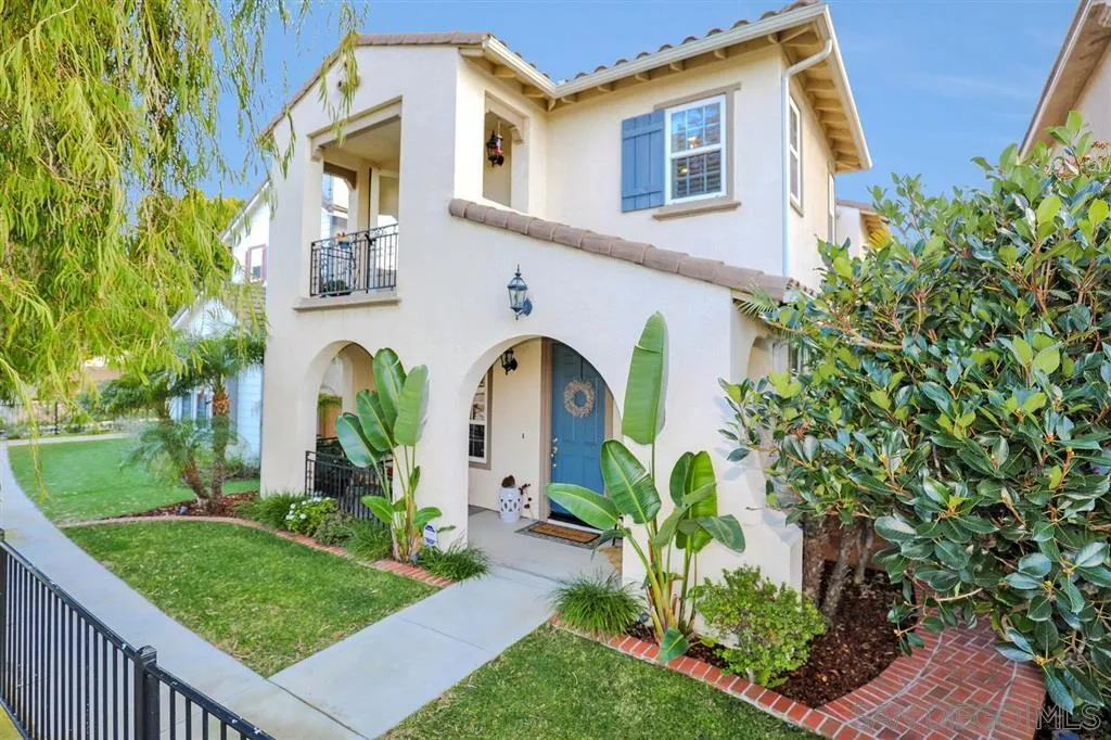 16691 Deer Ridge Road San Diego, CA 92127 - Photo 1 of 20 a front view of a house with garden