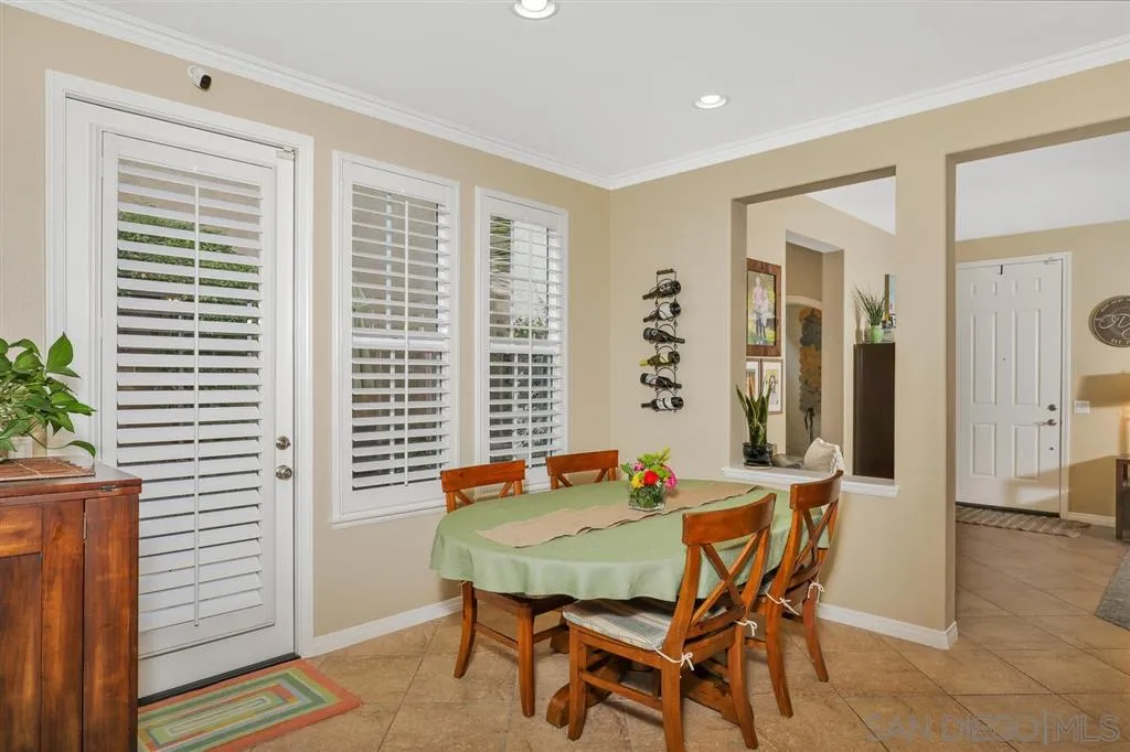 16691 Deer Ridge Road San Diego, CA 92127 - Photo 4 of 20 a dining room with furniture and window
