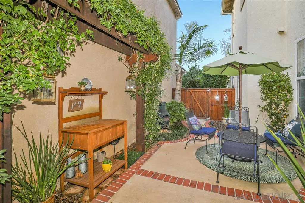16691 Deer Ridge Road San Diego, CA 92127 - Photo 6 of 20 a view of a chairs and table in patio
