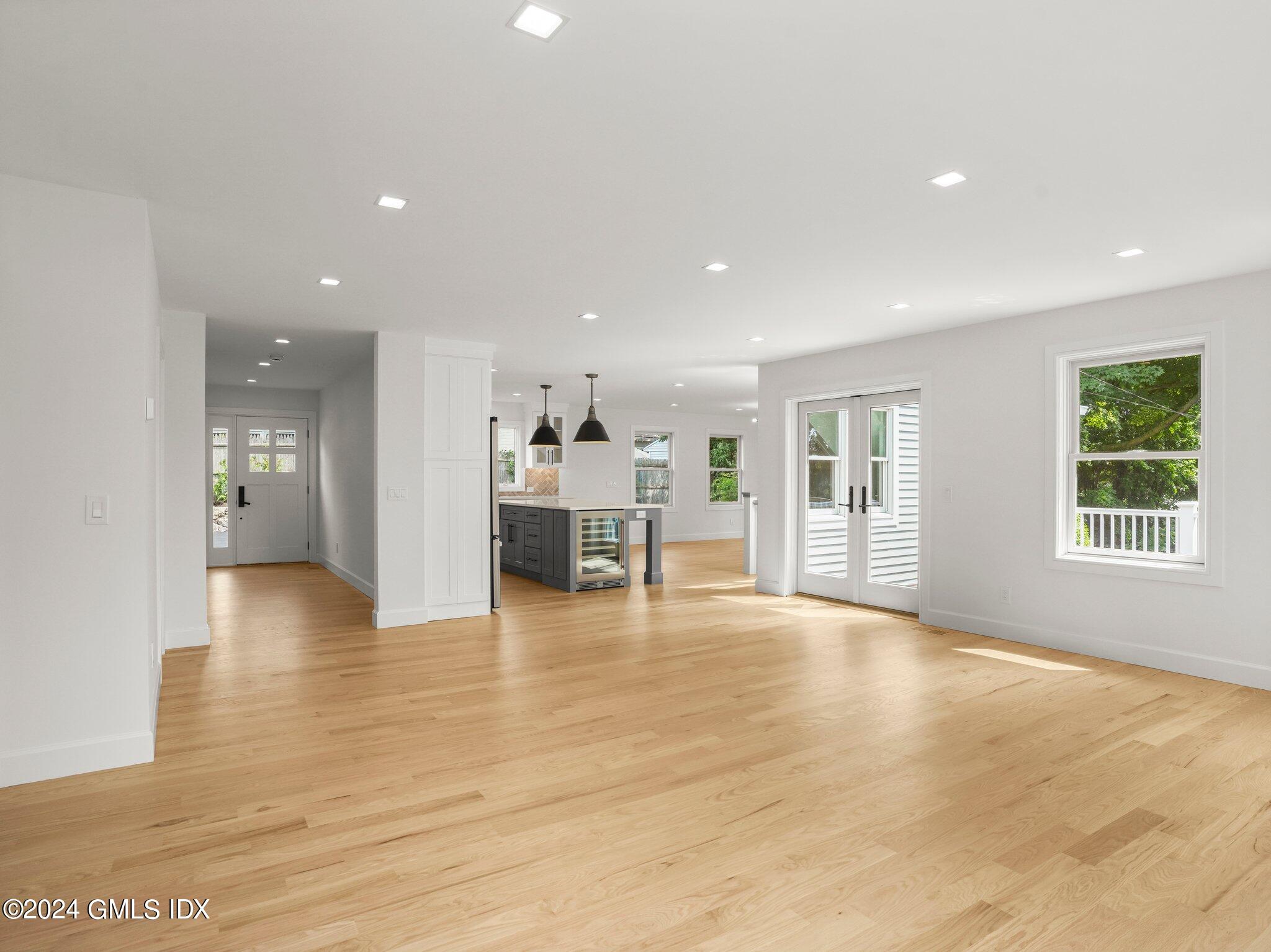 14 Rockland Place Greenwich, CT 06831 - Photo 12 of 54 a view of an empty room with kitchen and window