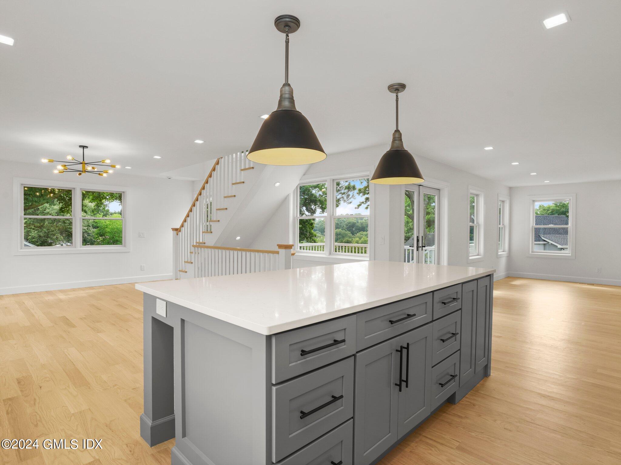 14 Rockland Place Greenwich, CT 06831 - Photo 19 of 54 a kitchen with a sink a window and stainless steel appliances