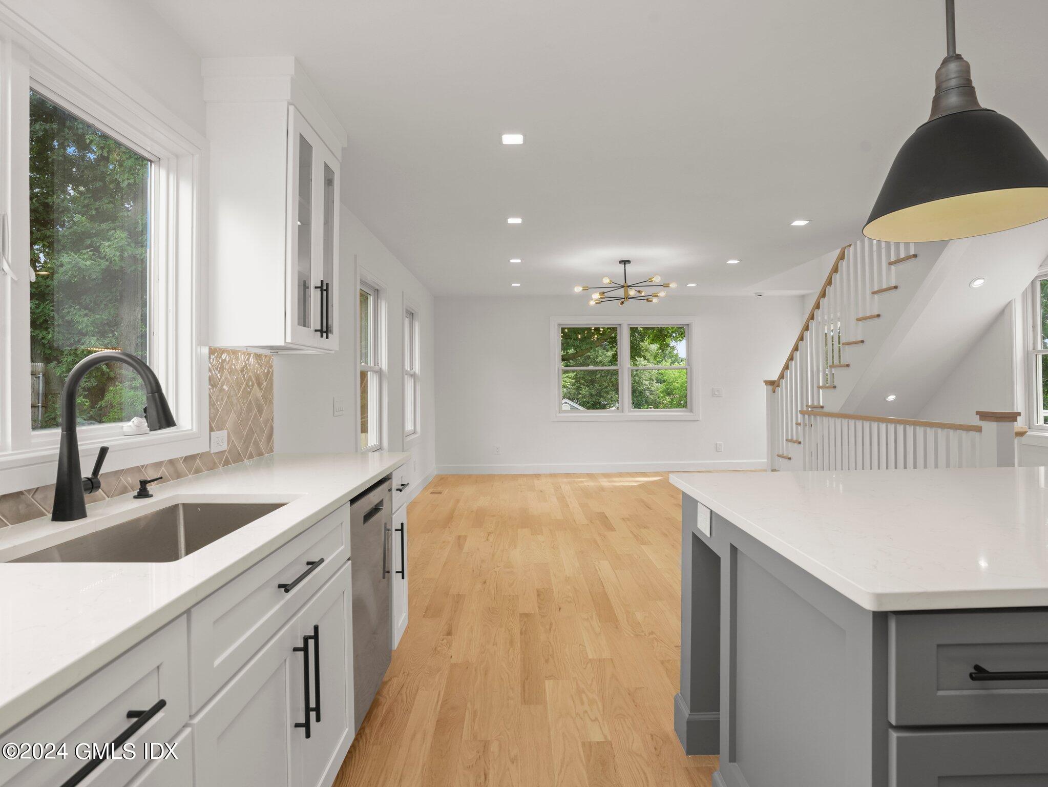 14 Rockland Place Greenwich, CT 06831 - Photo 20 of 54 a kitchen with a sink and a large window