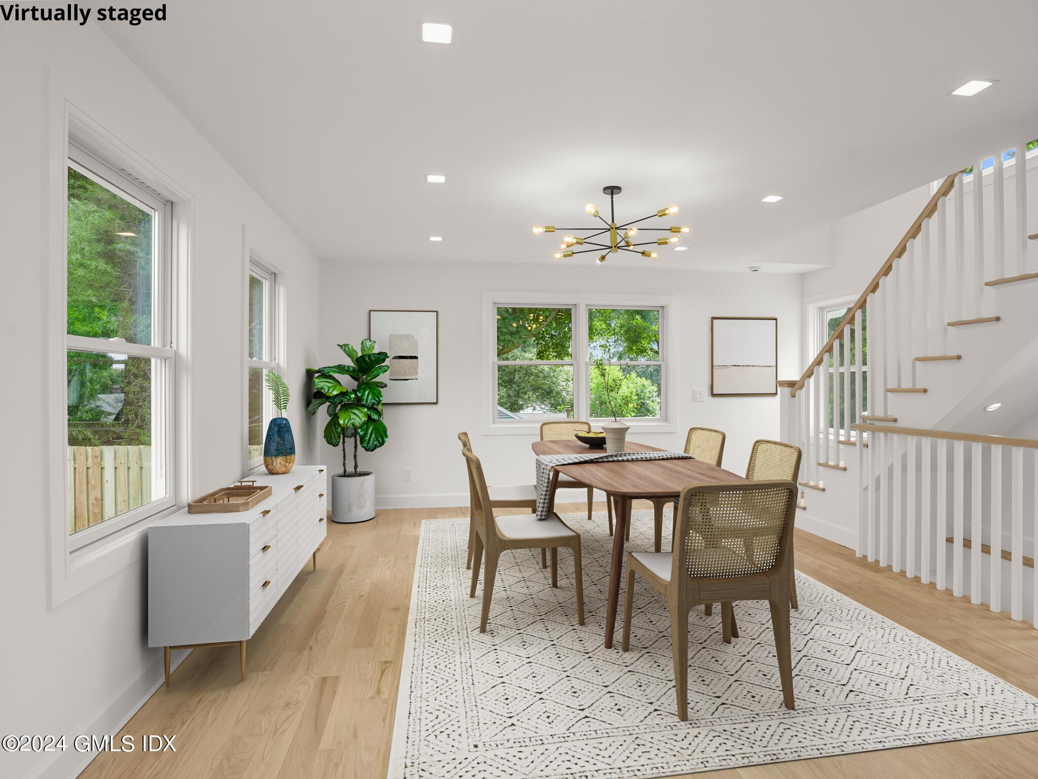 14 Rockland Place Greenwich, CT 06831 - Photo 22 of 54 a view of a dining room with furniture window and wooden floor