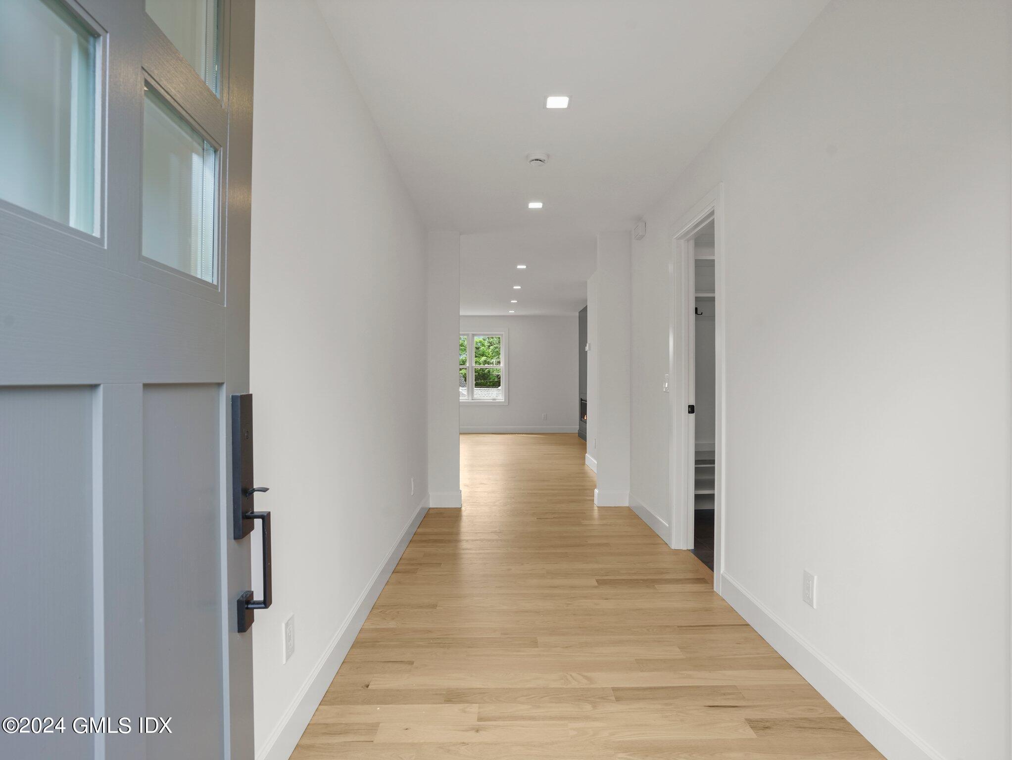 14 Rockland Place Greenwich, CT 06831 - Photo 3 of 54 a view of a hallway with wooden floor