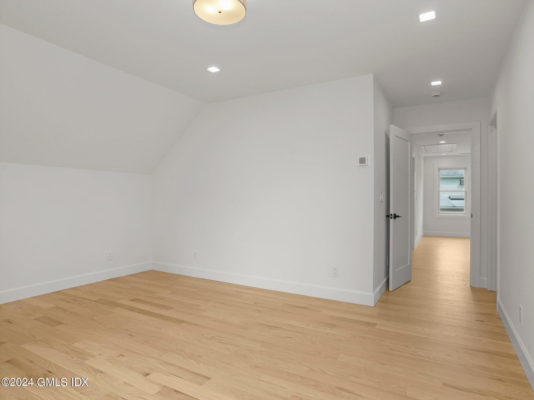 14 Rockland Place Greenwich, CT 06831 - Photo 38 of 54 a view of empty room with wooden floor