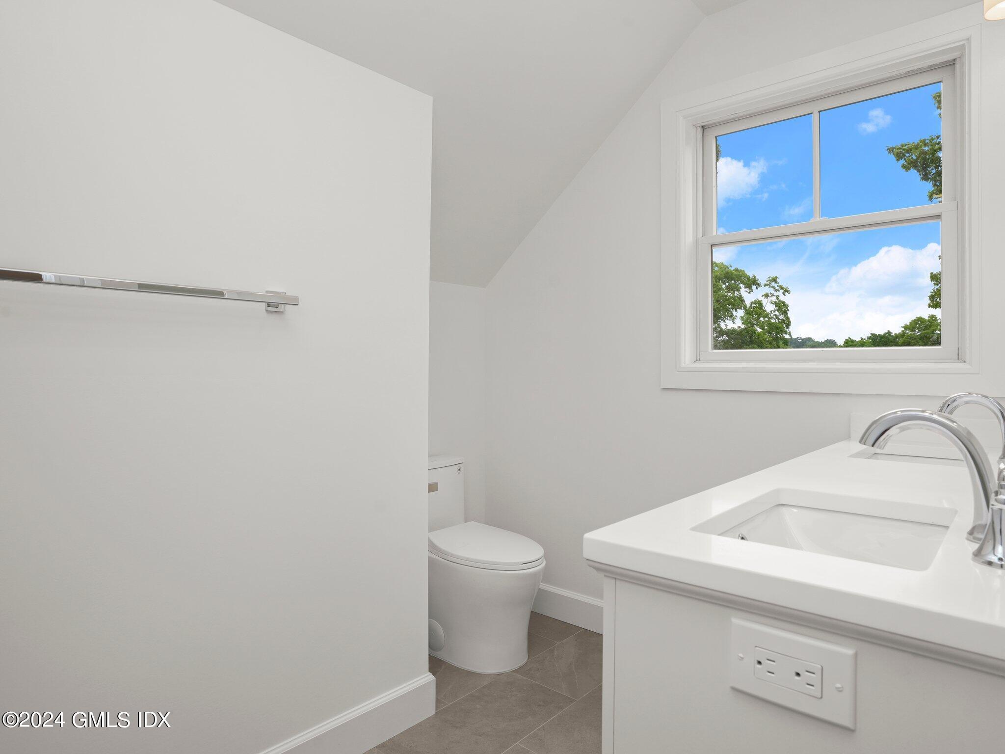 14 Rockland Place Greenwich, CT 06831 - Photo 39 of 54 a bathroom with a sink and toilet