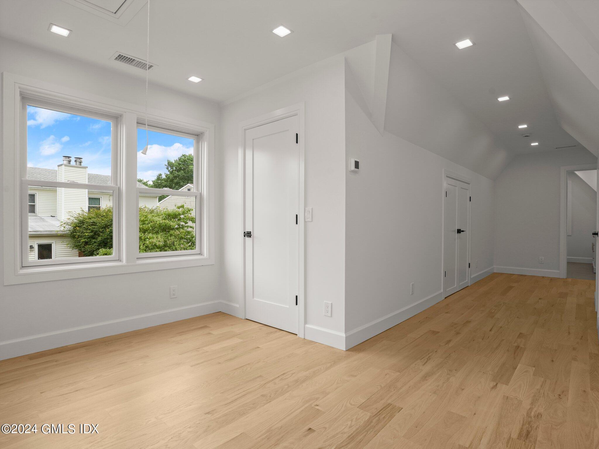 14 Rockland Place Greenwich, CT 06831 - Photo 41 of 54 a view of an empty room with a window