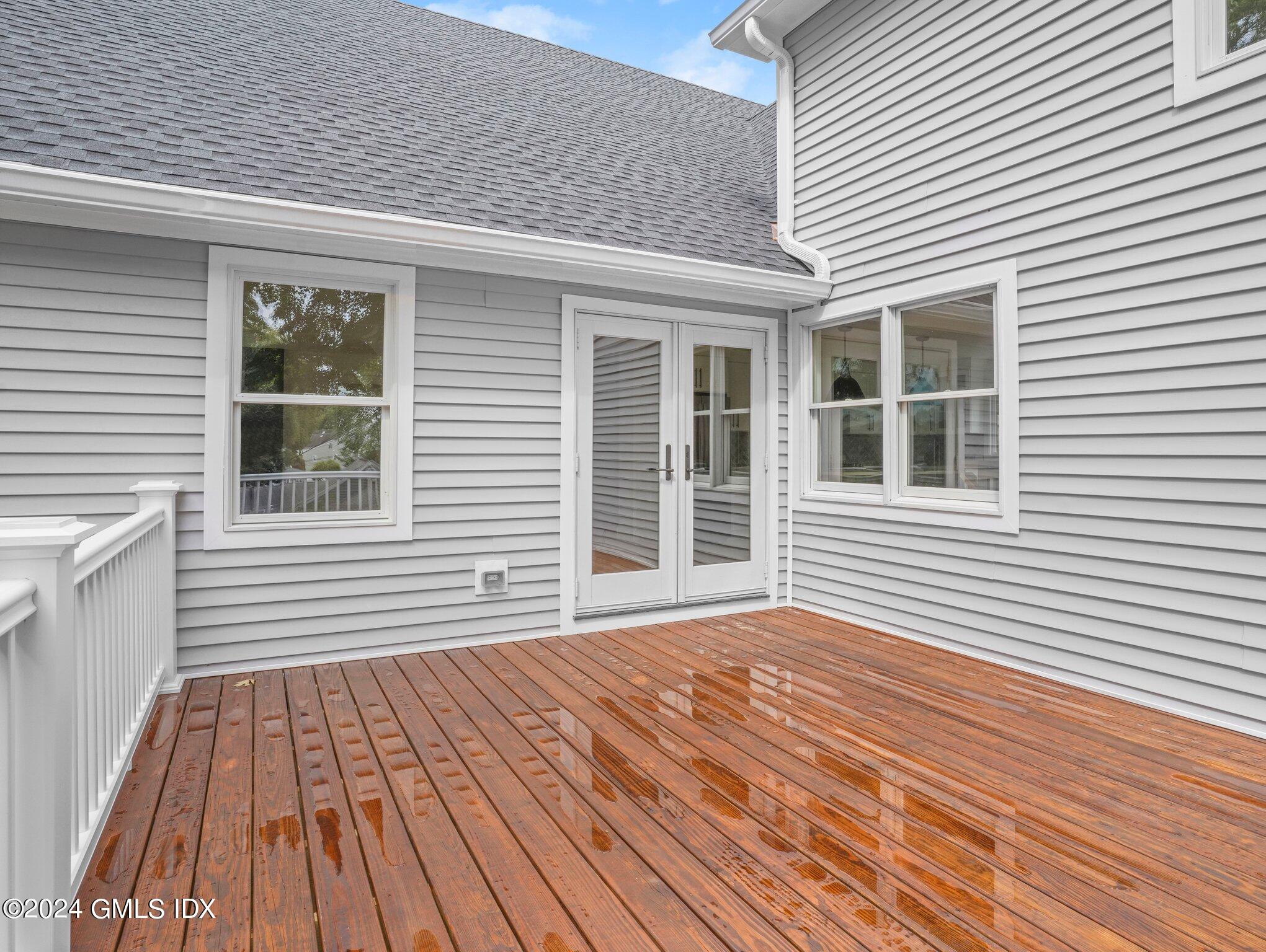 14 Rockland Place Greenwich, CT 06831 - Photo 49 of 54 a front view of a house with a porch
