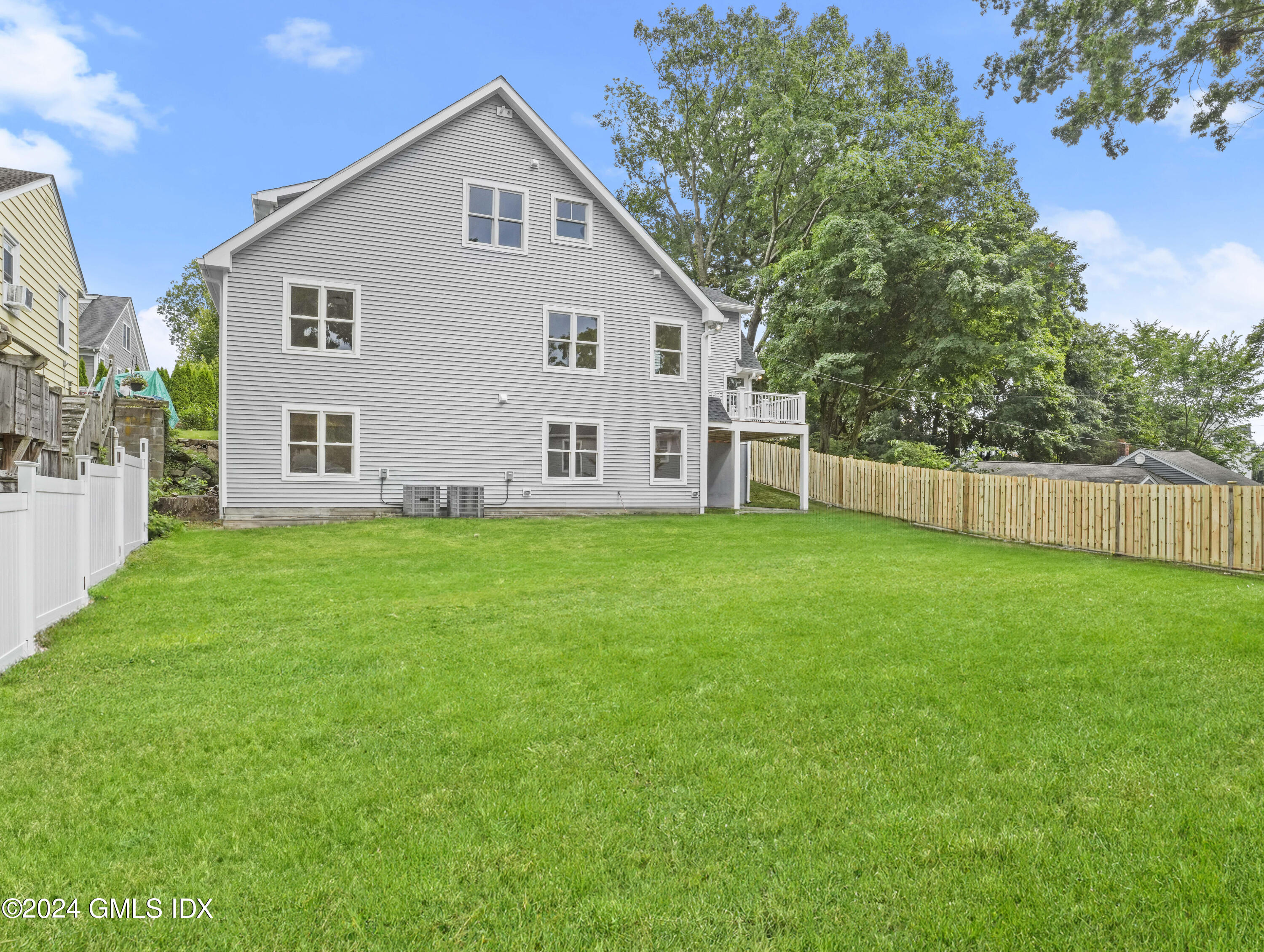 14 Rockland Place Greenwich, CT 06831 - Photo 51 of 54 a view of a house with backyard and garden