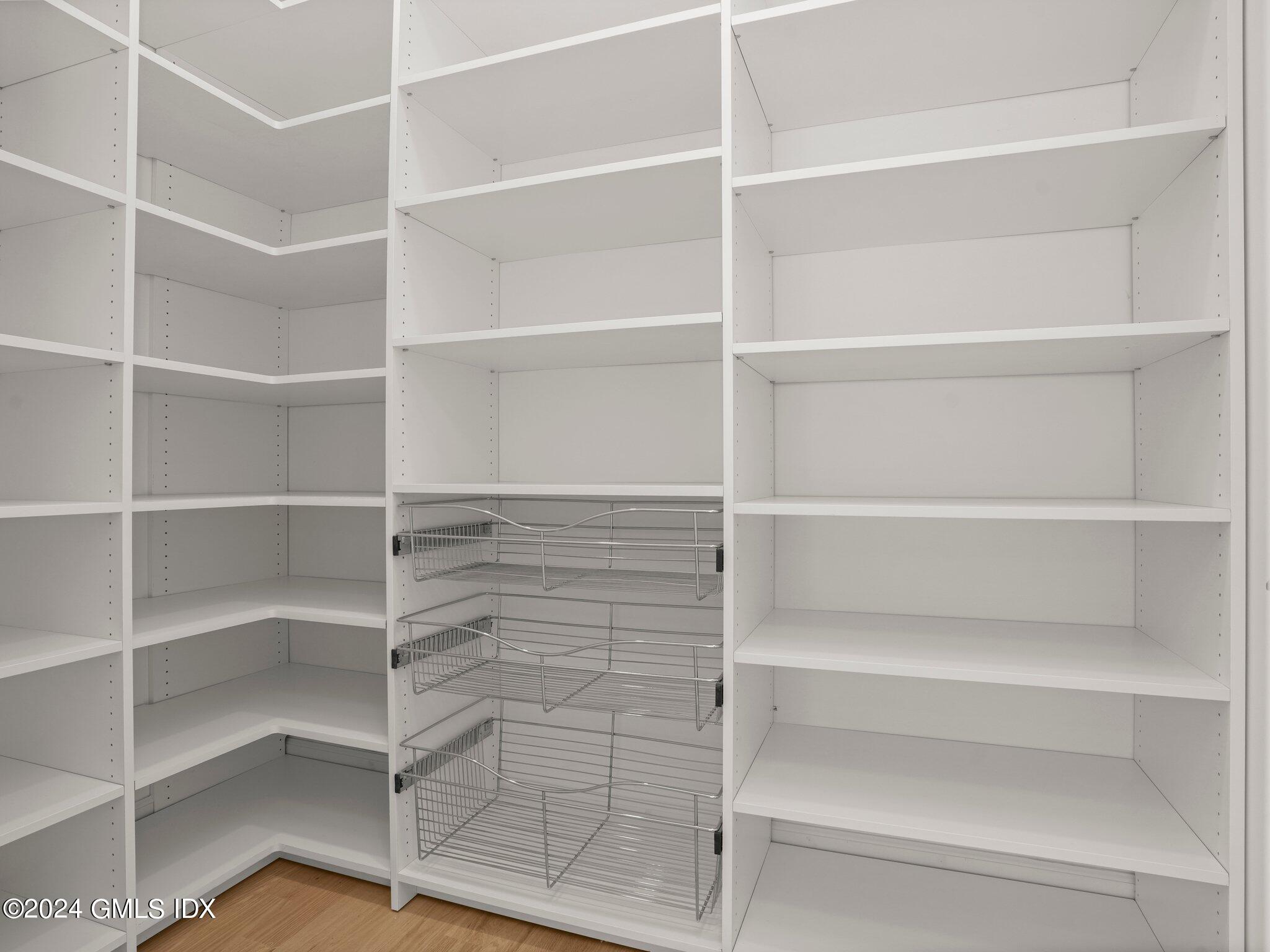 14 Rockland Place Greenwich, CT 06831 - Photo 6 of 54 a view of walk in closet with empty racks