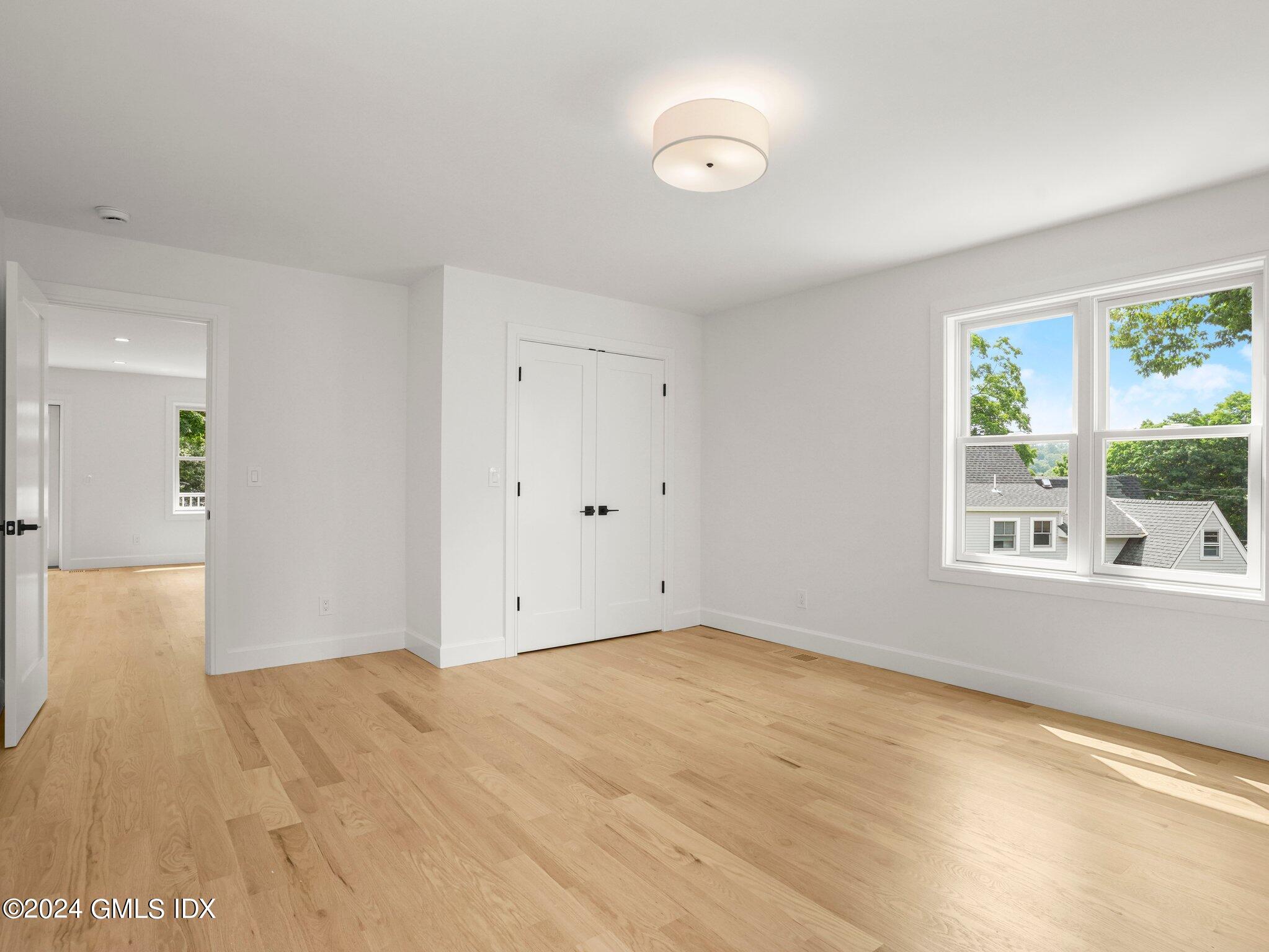 14 Rockland Place Greenwich, CT 06831 - Photo 9 of 54 a view of empty room with window