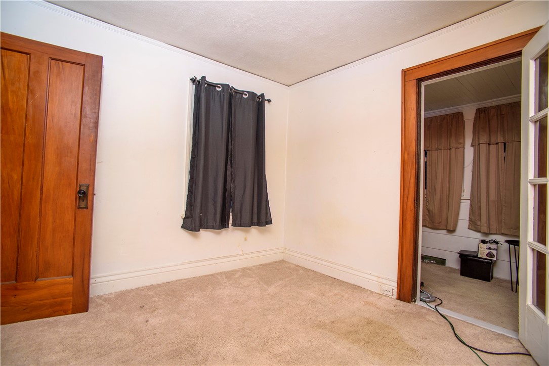 20 Raeburn Avenue Rochester, NY 14619 - Photo 17 of 23 Bedroom 2 w/ Office on Back Porch