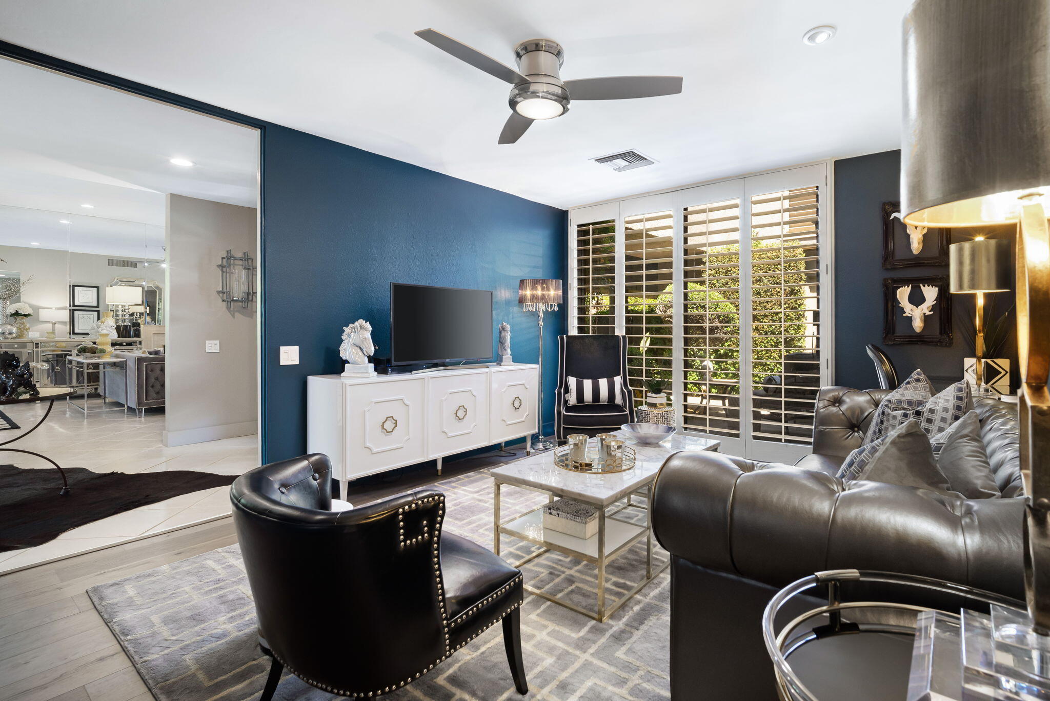 Undisclosed Address Rancho Mirage, CA 92270 - Photo 13 of 52 a living room with furniture and a flat screen tv