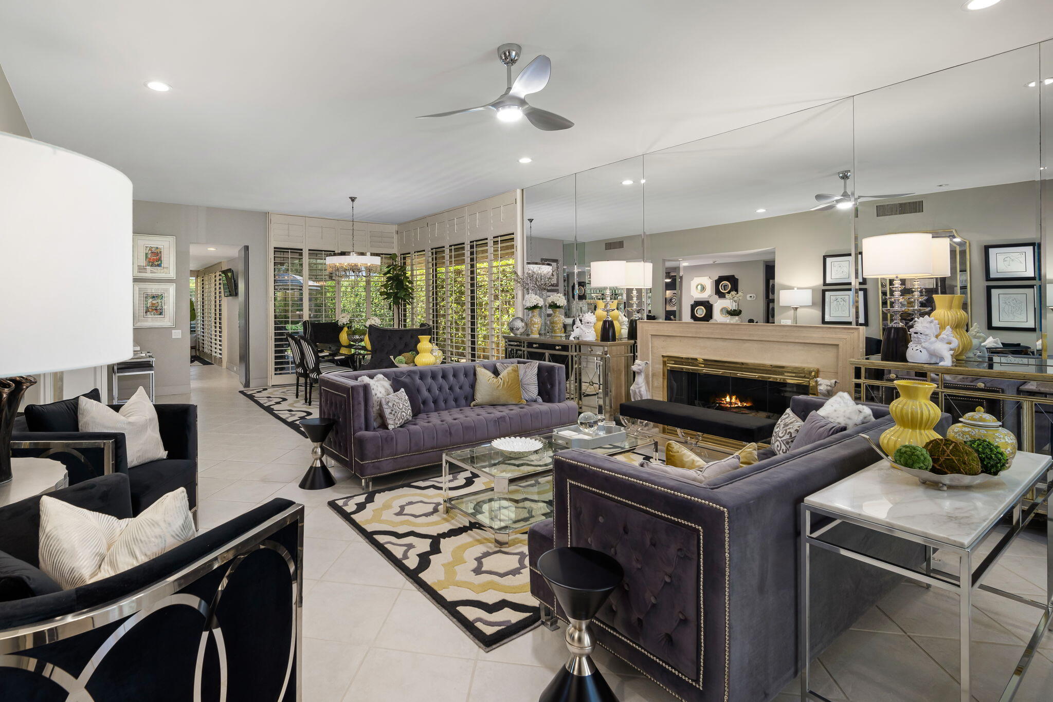Undisclosed Address Rancho Mirage, CA 92270 - Photo 14 of 52 a living room with furniture and a fireplace