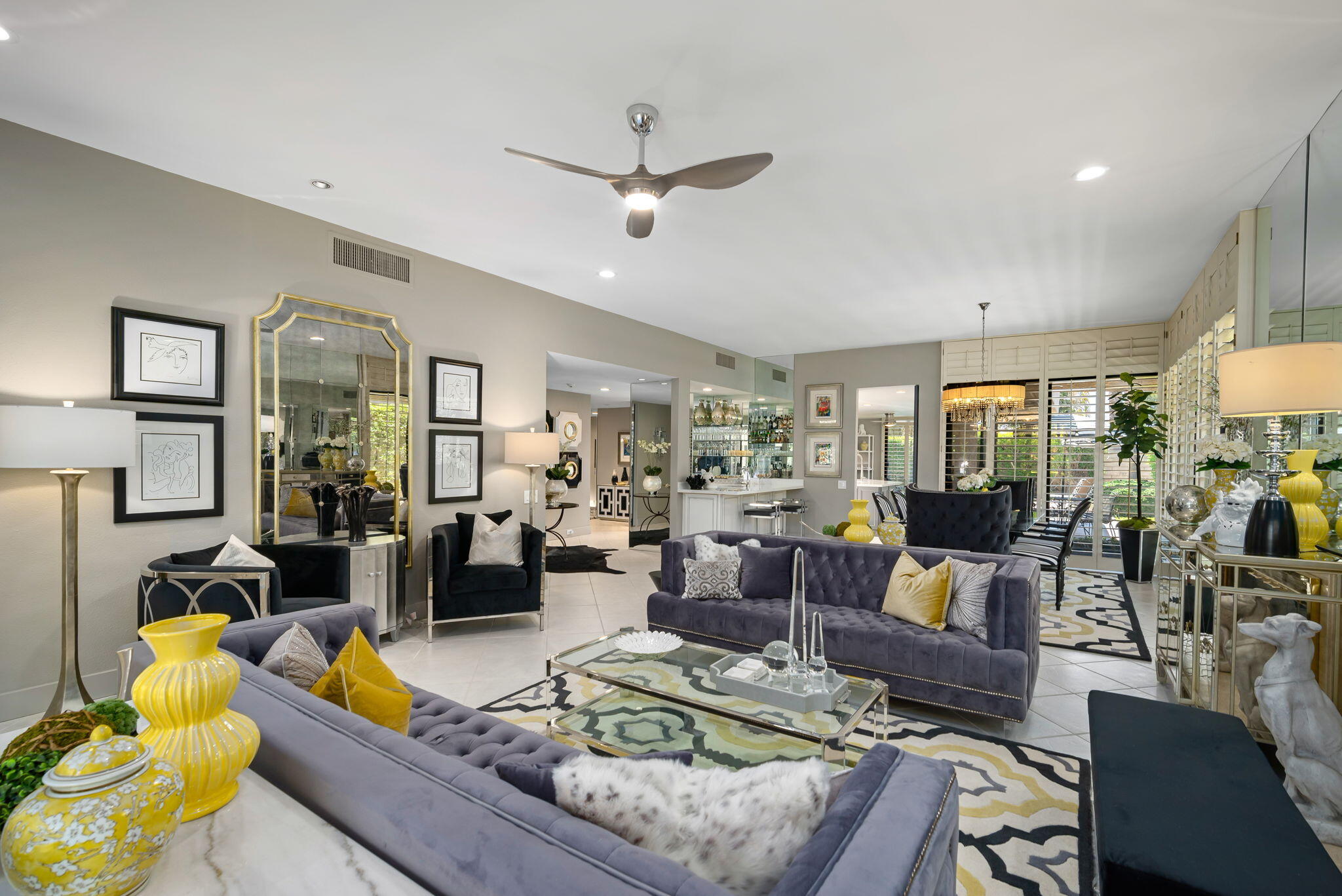 Undisclosed Address Rancho Mirage, CA 92270 - Photo 15 of 52 a living room with furniture and a large window