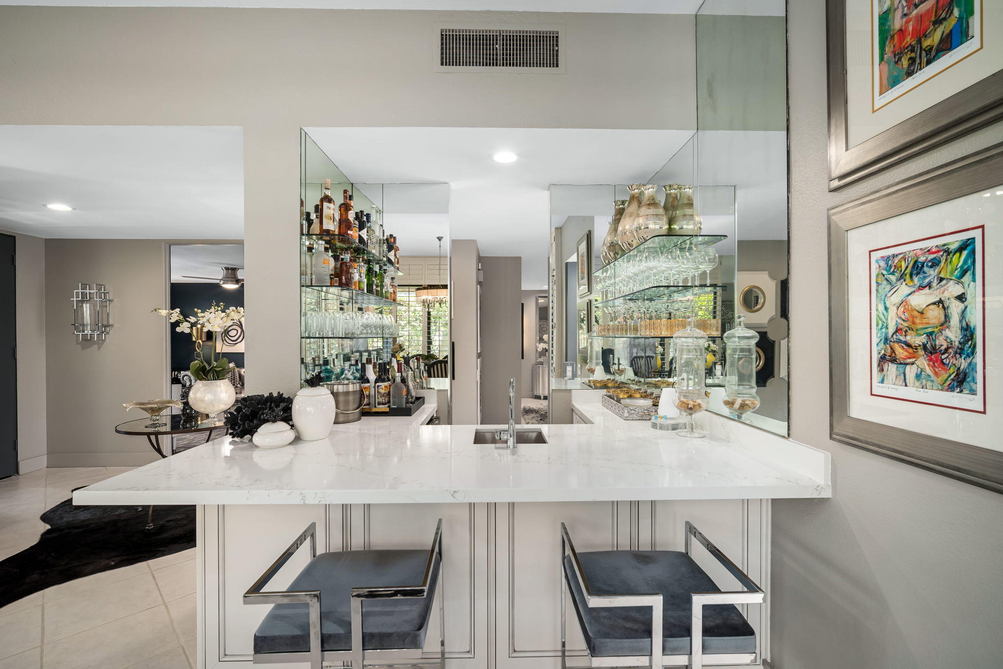 Undisclosed Address Rancho Mirage, CA 92270 - Photo 21 of 52 a kitchen with a table and chairs in it