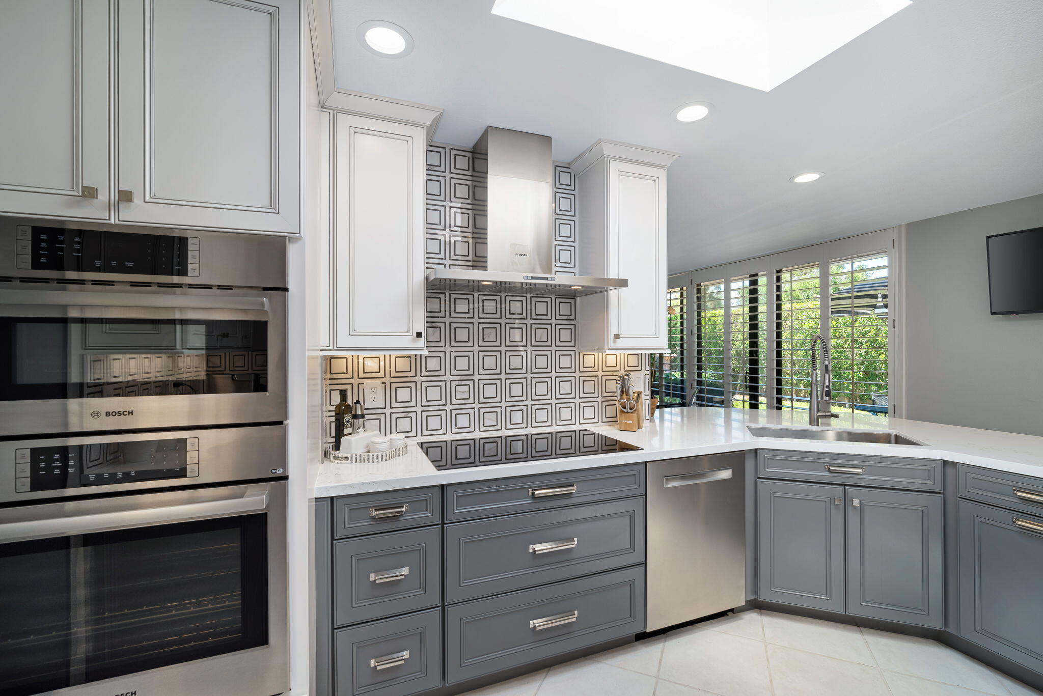 Undisclosed Address Rancho Mirage, CA 92270 - Photo 24 of 52 a kitchen with a sink and cabinets