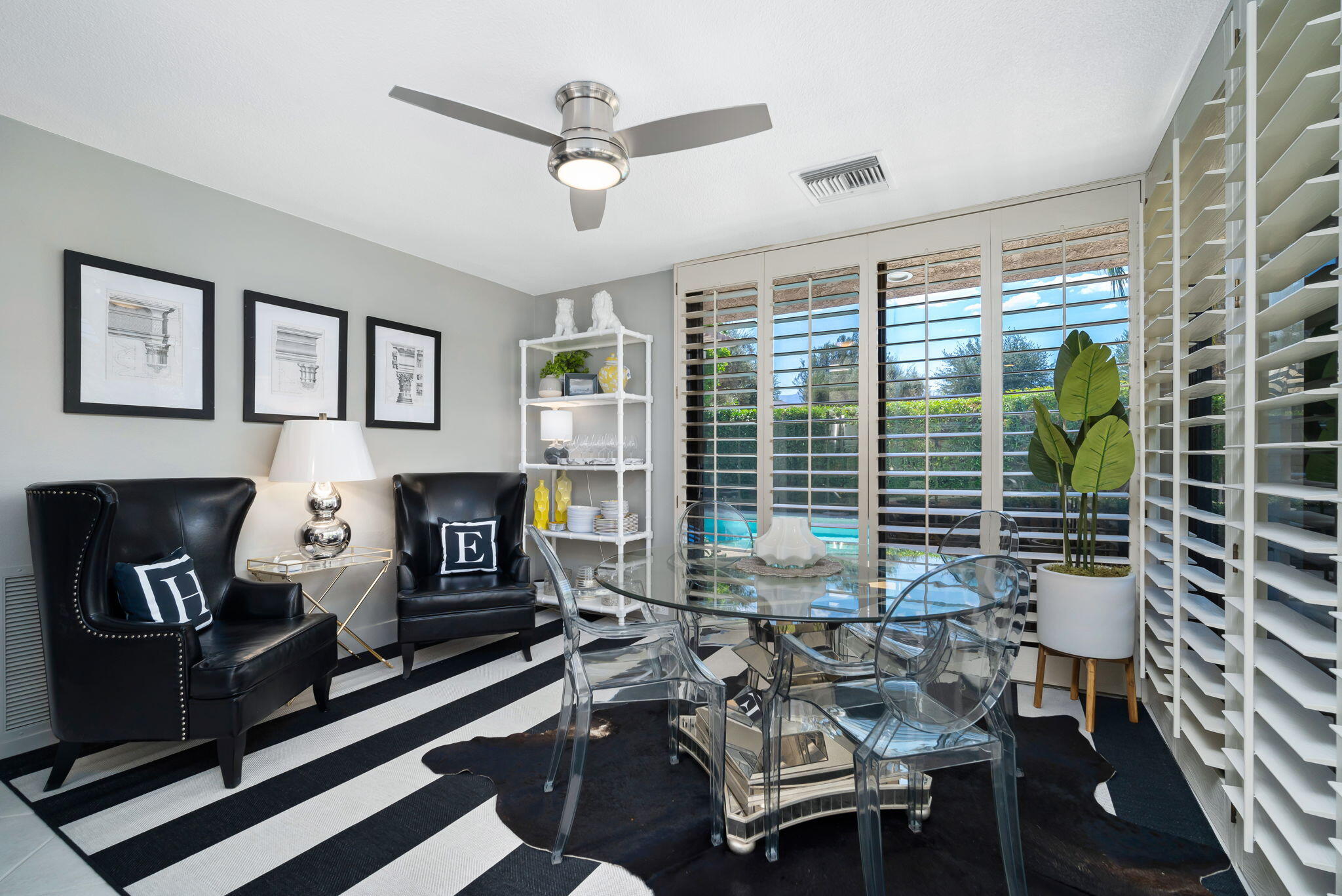 Undisclosed Address Rancho Mirage, CA 92270 - Photo 26 of 52 a living room with furniture and a floor to ceiling window