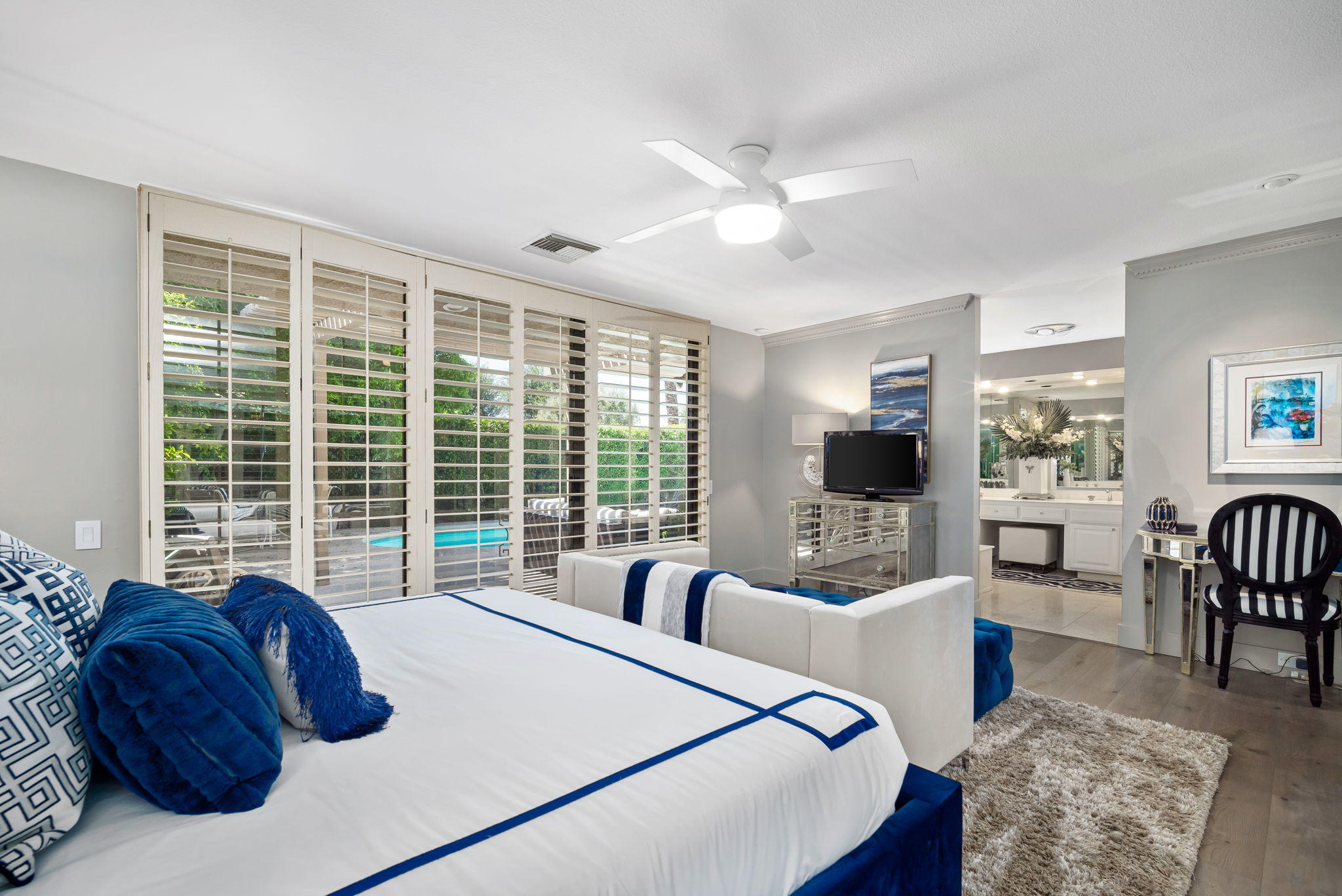 Undisclosed Address Rancho Mirage, CA 92270 - Photo 30 of 52 a bed room with a bed and a couch