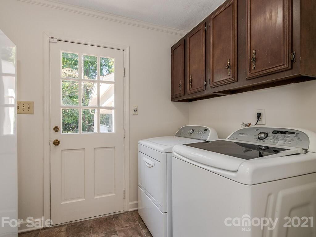 4920 Pine Ridge Road Charlotte, NC 28226 - Photo 11 of 28 a utility room with dryer and washer