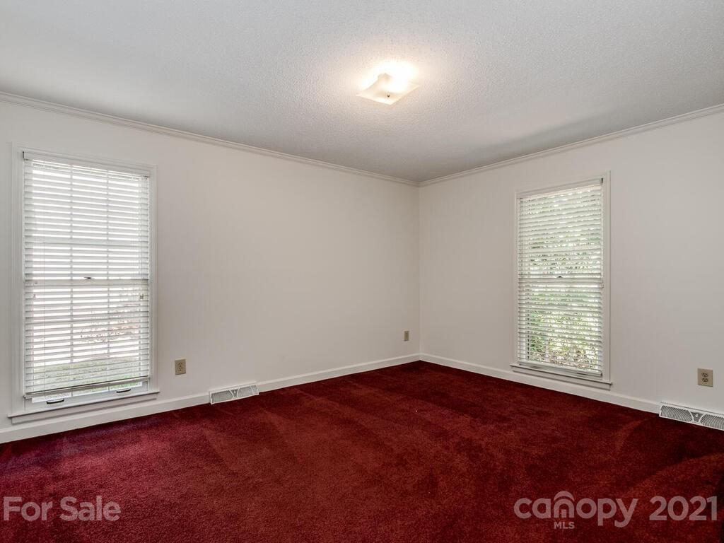 4920 Pine Ridge Road Charlotte, NC 28226 - Photo 18 of 28 an empty room with a window