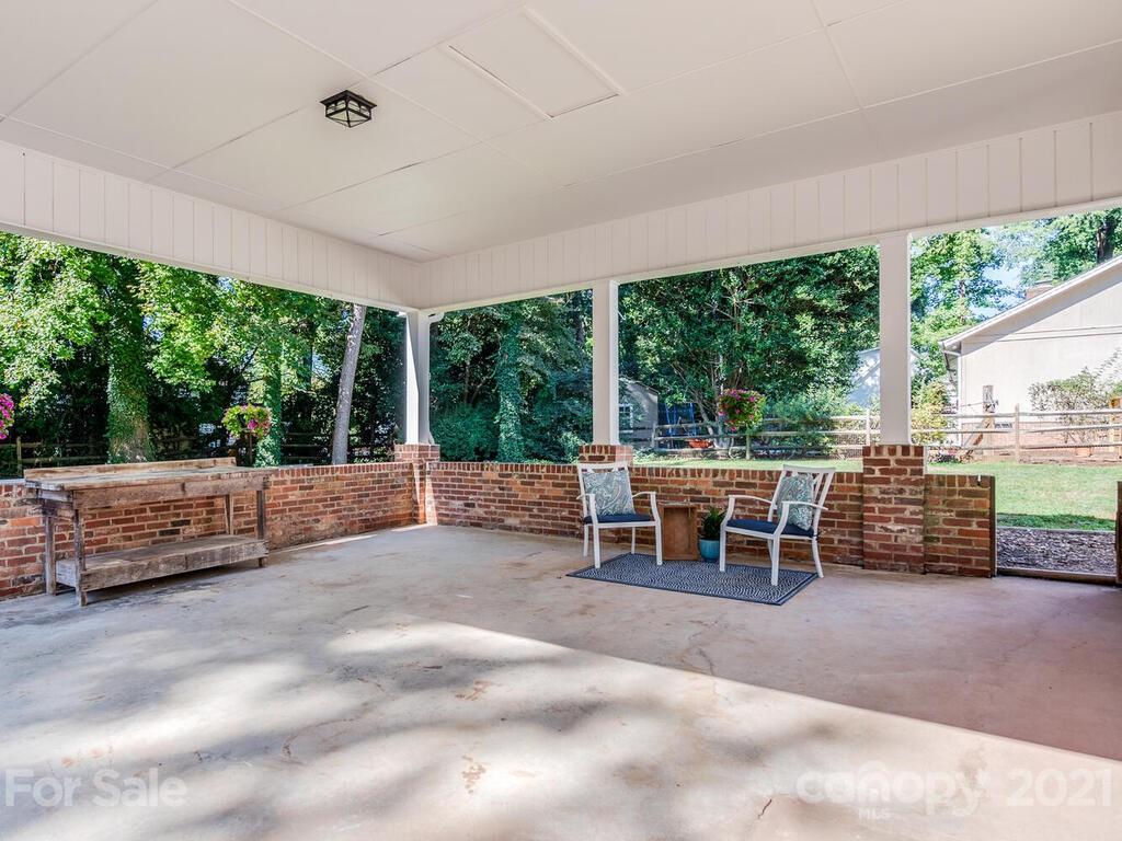 4920 Pine Ridge Road Charlotte, NC 28226 - Photo 25 of 28 a view of a patio with a yard