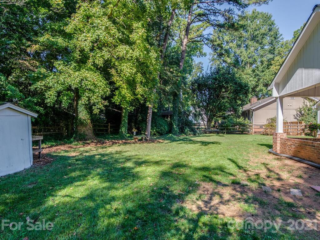 4920 Pine Ridge Road Charlotte, NC 28226 - Photo 28 of 28 a view of a backyard with a garden