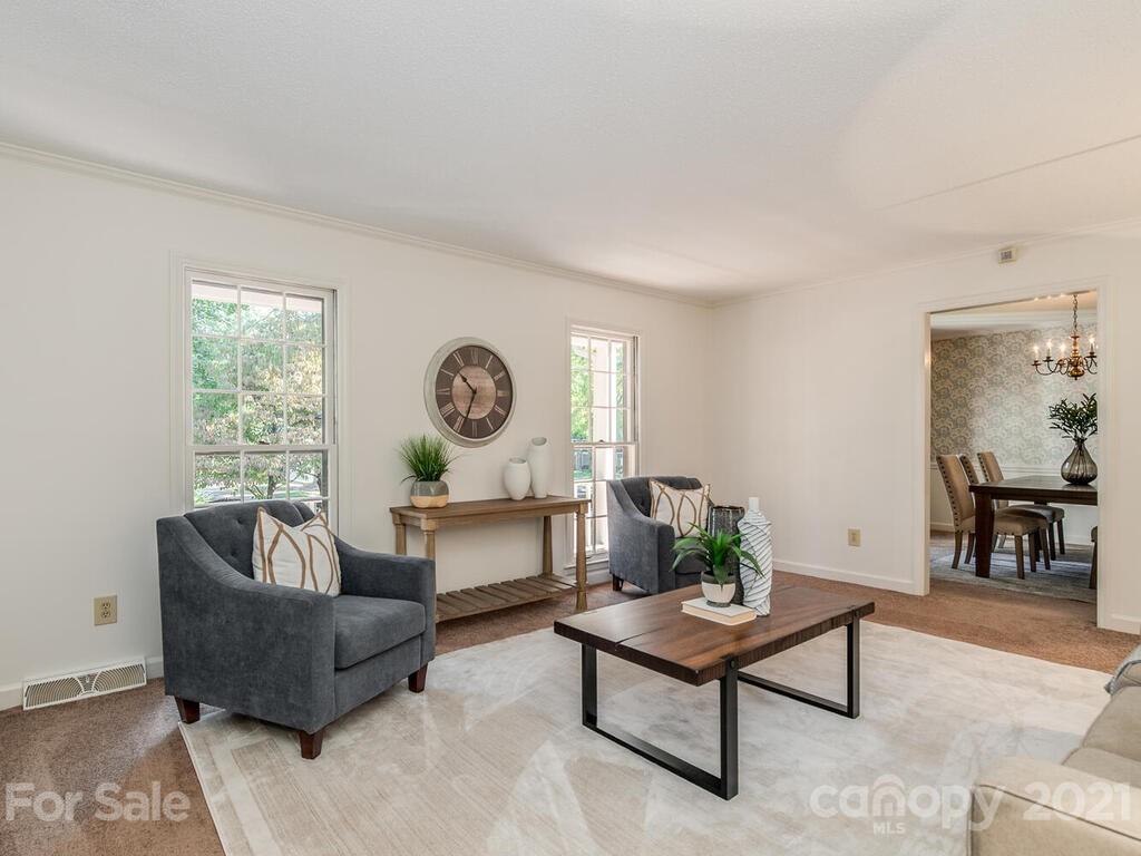 4920 Pine Ridge Road Charlotte, NC 28226 - Photo 4 of 28 a living room with furniture and a large window