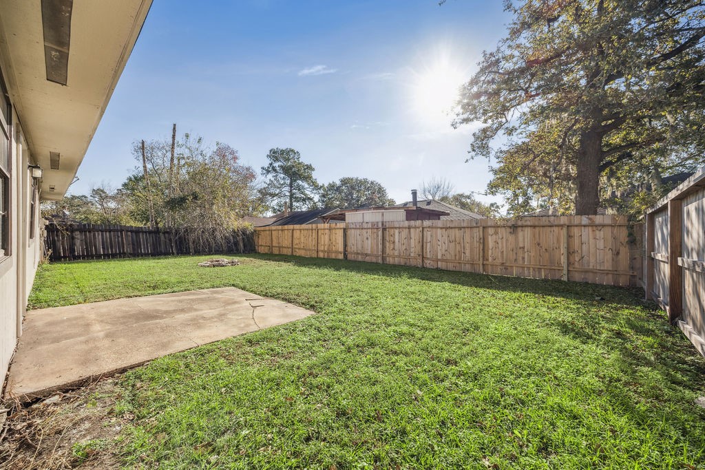 5602 Bridgegate Drive Spring, TX 77373 - Photo 15 of 17 a view of a backyard with pathway